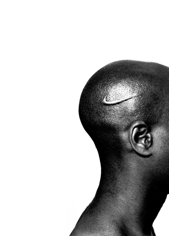 Hank Willis Thomas, Branded Head, series Branded, Lambda photograph, 40 x 30 inches, 2003.