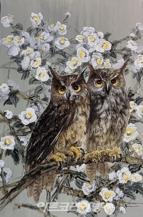 천의 얼굴, 부엉이에 빠진 작가 민병구