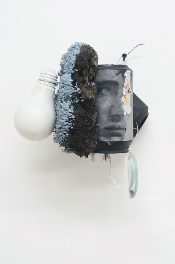 Untitled, 2013, soda cans, spray paint, Xerox, lightbulb, wire, magnifying glass, monofilament, sea sponge, acrylic, string, screw, 10 × 6 × 7 inches; 25.4 × 15.2 × 17.7 cm